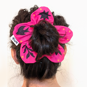 Coletero flor fucsia
